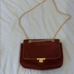 Red Express bag with gold chain strap